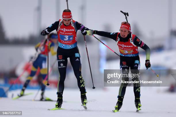 Sophia Schneider of Germany changes over to Denise Herrmann-Wick of Germany in the last exchange during the Women 4x6 km Relay at the IBU World...
