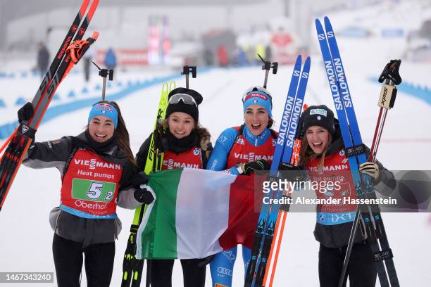 Gold medalists Dorothea Wierer of Italy, Hannah Auchentaller of Italy, Lisa Vittozzi of Italy and Samuela Comola of Italy celebrate after winning the...