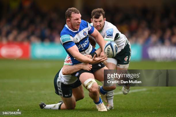 Sam Underhill of Bath takes on Paddy Jackson and James Stokes of London Irish during the Gallagher Premiership Rugby match between Bath Rugby and...
