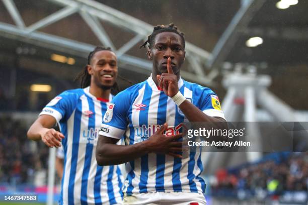 Joseph Hungbo and David Kasumu of Huddersfield Town celebrates as Huddersfield's first goal of the match is scored during the Sky Bet Championship...