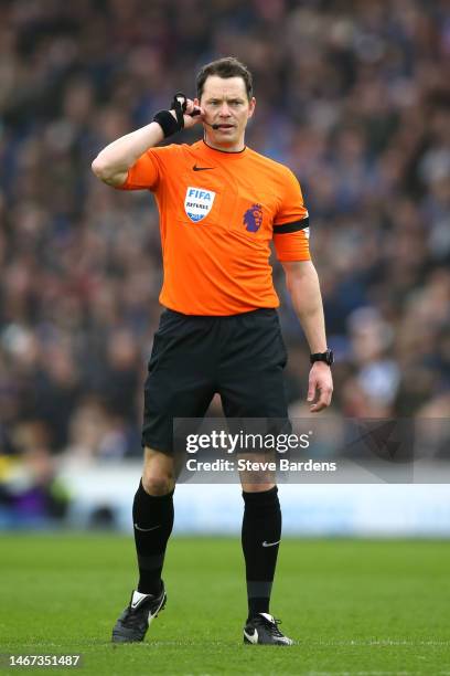 Referee Darren England looks on during the Premier League match between Brighton & Hove Albion and Fulham FC at American Express Community Stadium on...