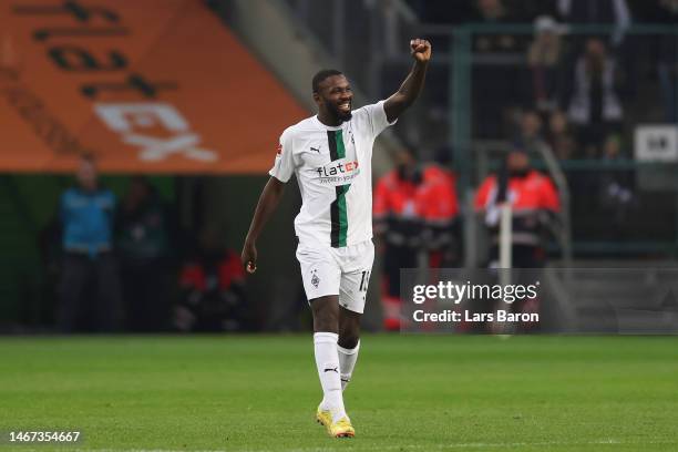 Marcus Thuram of Borussia Moenchengladbach celebrates after scoring the team's third goal during the Bundesliga match between Borussia...