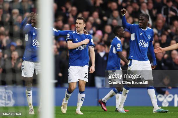 Seamus Coleman of Everton celebrates after scoring the team's first goal with teammates during the Premier League match between Everton FC and Leeds...