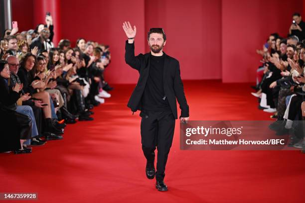 David Koma walks the runway at the David Koma show during London Fashion Week February 2023 on February 18, 2023 in London, England.