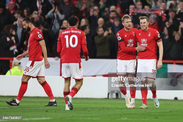Chris Wood of Nottingham Forest celebrates after scoring the team's first goal with teammates during the Premier League match between Nottingham...