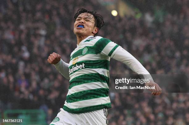 Reo Hatate of Celtic celebrates after scoring his team's third goal during the Cinch Scottish Premiership match between Celtic FC and Aberdeen FC at...