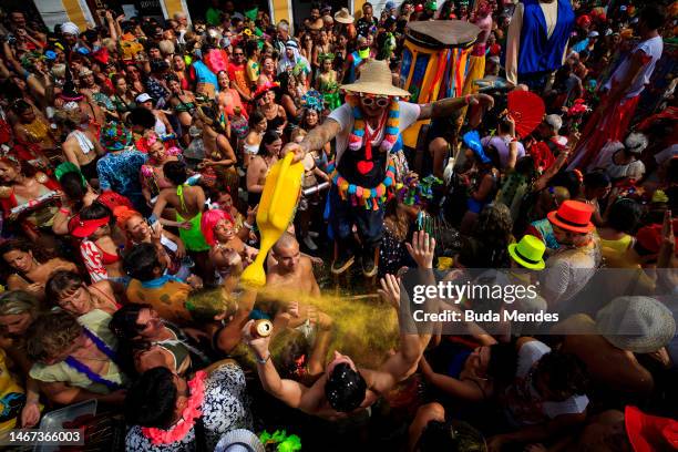 Revellers attend the annual block party known as "Ceu na Terra" on the second day of Carnival on February 18, 2023 in Rio de Janeiro, Brazil.