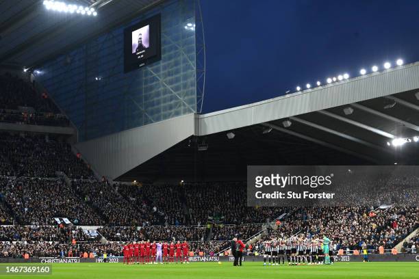 Players, officials and fans observe a minutes silence in memory of former Premier League player Christian Atsu, who was recovered from the rubble of...