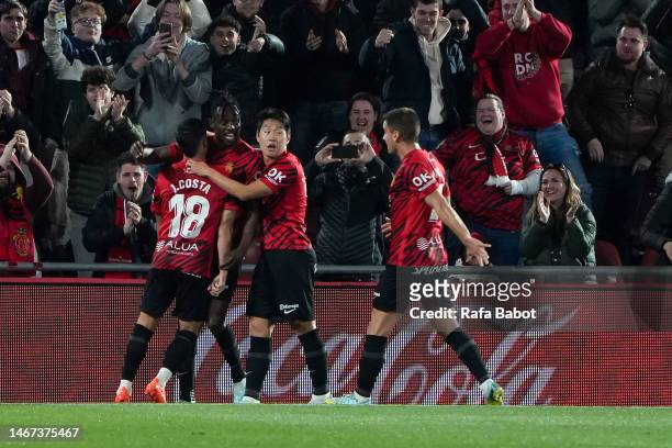 Tino Kadewere of RCD Mallorca celebrates scoring his side's first goal with his teammates during the LaLiga Santander match between RCD Mallorca and...