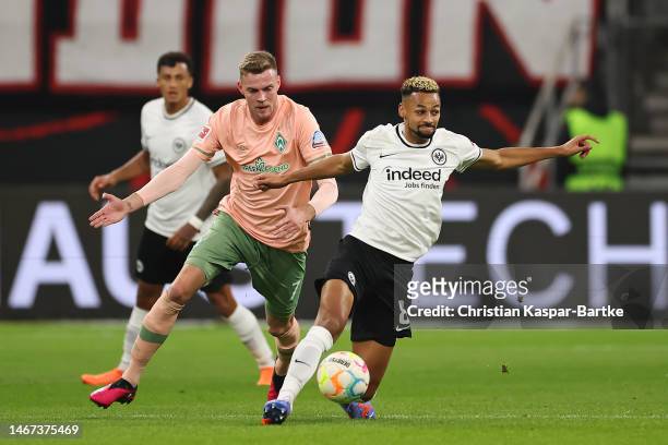 Djibril Sow of Eintracht Frankfurt is challenged by Marvin Ducksch of SV Werder Bremen during the Bundesliga match between Eintracht Frankfurt and SV...