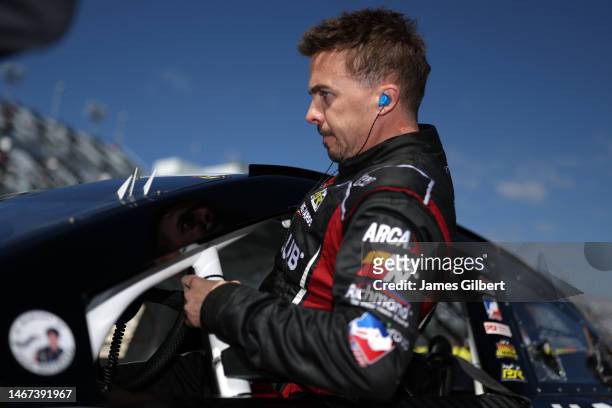 Frankie Muniz, driver of the Hair Club Ford, enters his car prior to the ARCA Menards Series BRANDT 200 Supporting Florida FFA at Daytona...