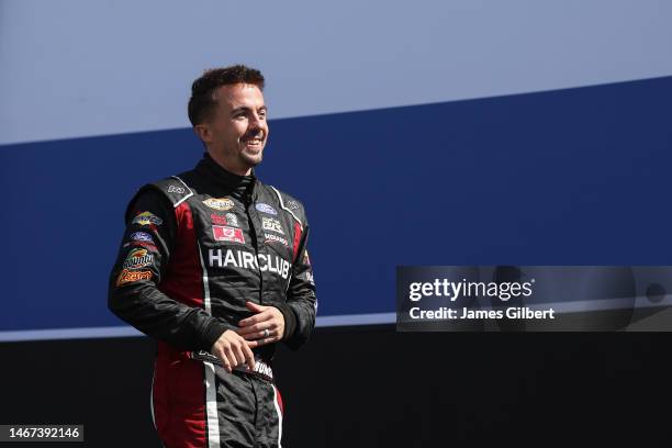 Frankie Muniz, driver of the Hair Club Ford, walks onstage during driver intros prior to prior to the ARCA Menards Series BRANDT 200 Supporting...