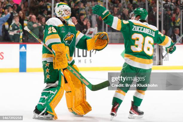 Marc-Andre Fleury and Mats Zuccarello of the Minnesota Wild celebrate after defeating the Buffalo Sabres at the Xcel Energy Center on January 28,...