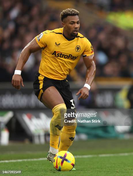 Adama Traore of Wolverhampton Wanderers runs with the ball during the Premier League match between Wolverhampton Wanderers and AFC Bournemouth at...