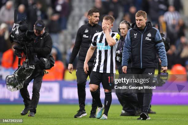 Matt Ritchie and Eddie Howe, Manager of Newcastle United, look dejected following the team's defeat in the Premier League match between Newcastle...