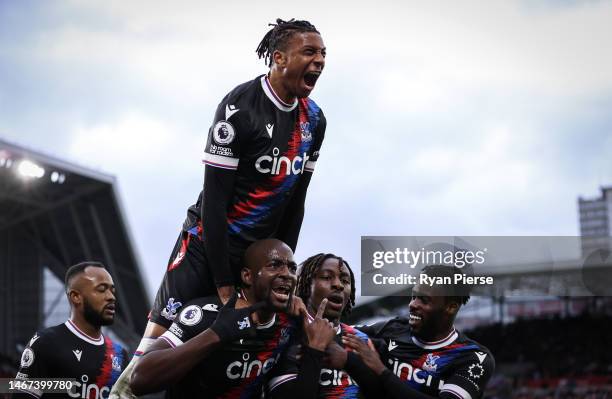 Michael Olise of Crystal Palace celebrates with teammates after Eberechi Eze scores the team's first goa during the Premier League match between...