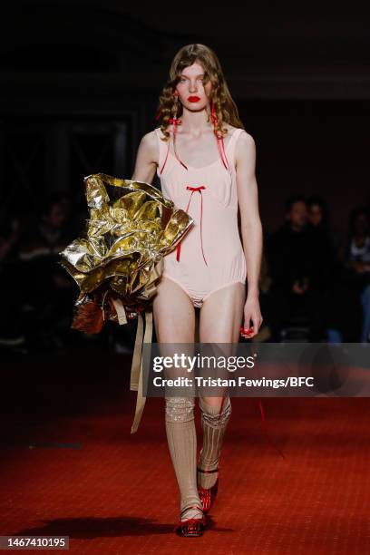 Model walks the runway at the Simone Rocha show during London Fashion Week February 2023 on February 18, 2023 in London, England.