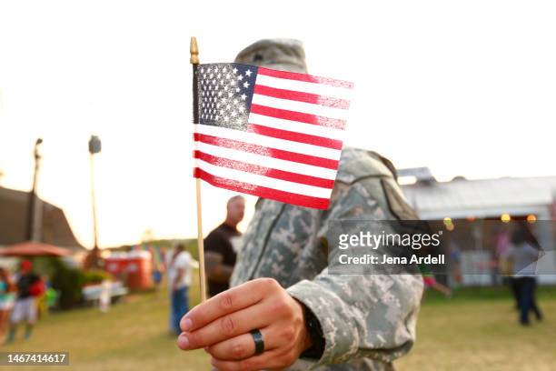 veteran american flag, military uniform, freedom concept: fourth of july or veteran's day - 米退役軍人の日 ストックフォトと画像