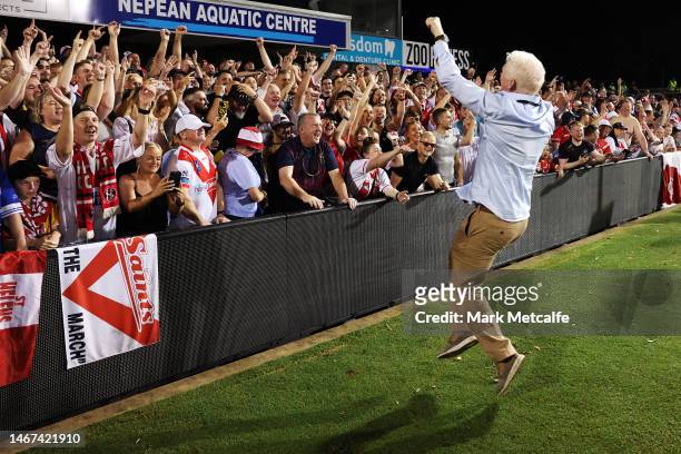 Saints chairman Eamonn McManus celebrates with fans after victory during the World Club Challenge and NRL Trial Match between the Penrith Panthers...