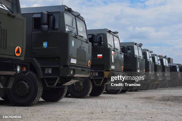 military trucks on a parking - military vehicle stock pictures, royalty-free photos & images