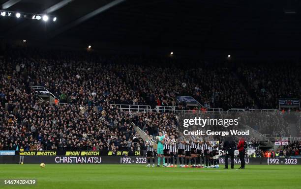 Newcastle United players applaud after a minutes silence in memory of former Premier League player Christian Atsu, who was recovered from the rubble...