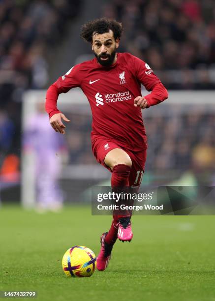 Mohamed Salah of Liverpool runs with the ball during the Premier League match between Newcastle United and Liverpool FC at St. James Park on February...