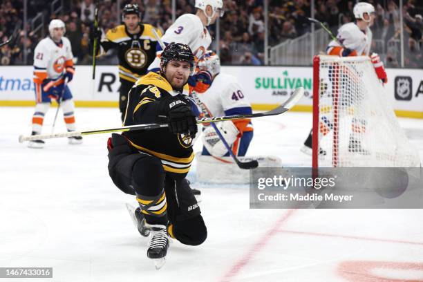 Jake DeBrusk of the Boston Bruins celebrates after scoring a goal against the New York Islanders during the first period at TD Garden on February 18,...