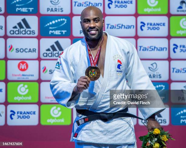 Over 100 kg gold medallist, three times Olympic champion and ten times World champion, Teddy Riner of France proudly shows his medal to the...