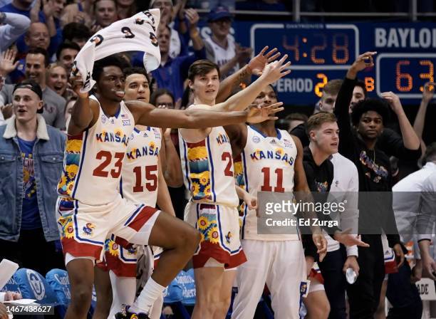 Ernest Udeh Jr. #23 of the Kansas Jayhawks celebrates with teammates during a game against the Baylor Bears in the second half of the game at Allen...