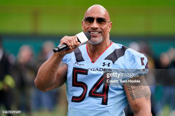 Owner Dwayne Johnson talks on the field before the game between the Arlington Renegades and the Vegas Vipers at Choctaw Stadium on February 18, 2023...