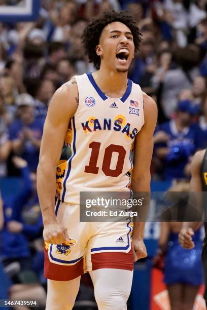 Jalen Wilson of the Kansas Jayhawks reacts to a teammate's basket against the Baylor Bears in the second half of the game at Allen Fieldhouse on...