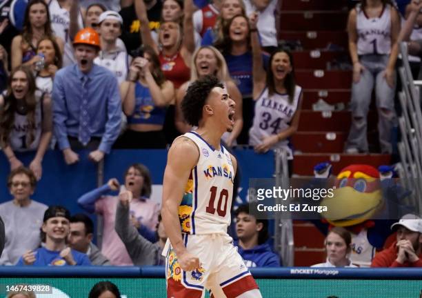 Jalen Wilson of the Kansas Jayhawks reacts after making a basket against the Baylor Bears in the second half of the game at Allen Fieldhouse on...