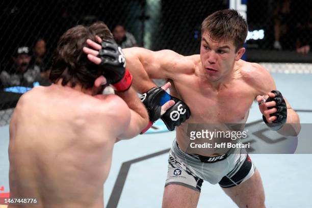 Alexander Hernandez elbows Jim Miller in a lightweight fight during the UFC Fight Night event at UFC APEX on February 18, 2023 in Las Vegas, Nevada.