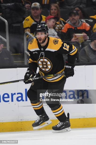 Craig Smith of the Boston Bruins skates against the New York Islanders at the TD Garden on February 18, 2023 in Boston, Massachusetts.