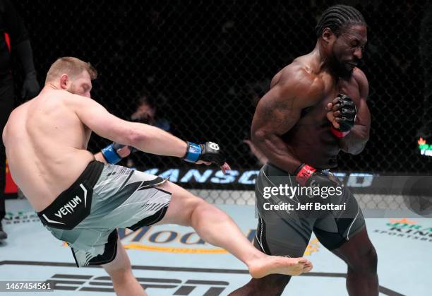 Marcin Prachnio of Poland kicks William Knight in a light heavyweight fight during the UFC Fight Night event at UFC APEX on February 18, 2023 in Las...