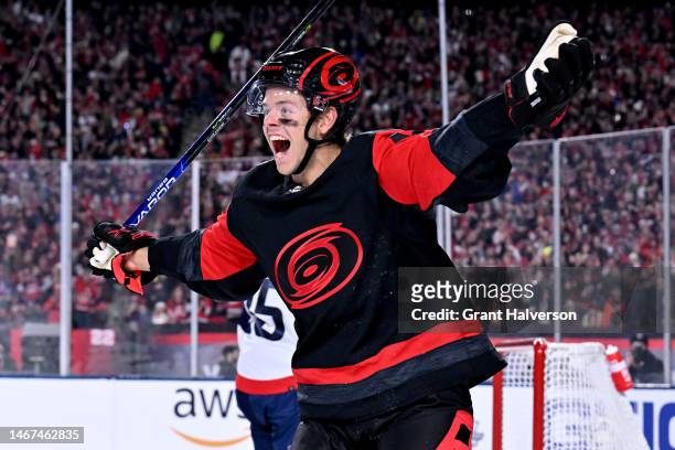 Jesperi Kotkaniemi of the Carolina Hurricanes reacts after scoring a goal against the Washington Capitals during the first period in the 2023 Navy...
