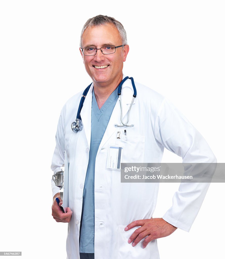 Close-up of a male doctor smiling on white background