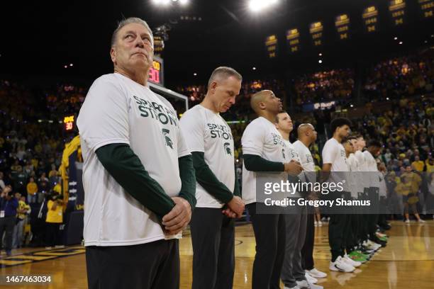 The Michigan State Spartans during the national anthem prior to playing the Michigan Wolverines at Crisler Arena on February 18, 2023 in Ann Arbor,...
