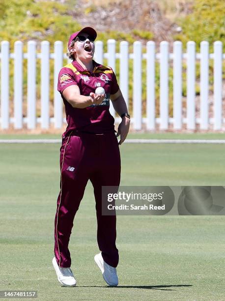 Laura Harris of Queensland celebrates taking the catch to dismiss Bridget Patterson of the Scorpions for 5 runs off the bowling of Nicola Hancock of...
