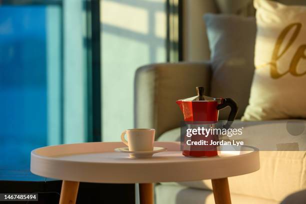 coffee break beside the window - couch close up stock pictures, royalty-free photos & images