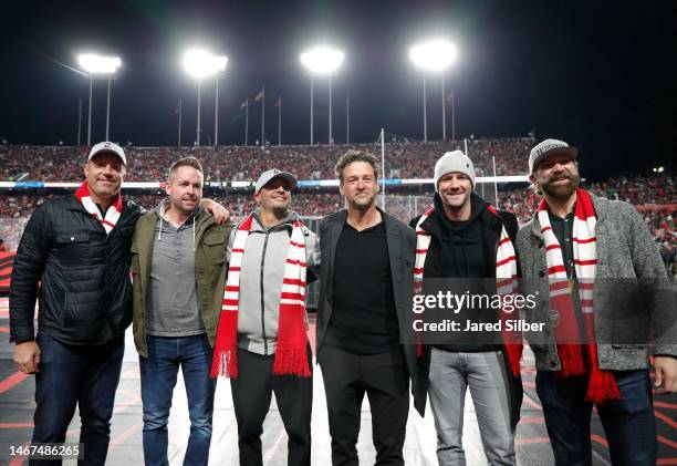 Former Carolina Hurricanes players from the 2006 team Mike Commodore, Aaron Ward, Chad LaRose, Justin Williams, Cam Ward and Erik Cole pose for a...