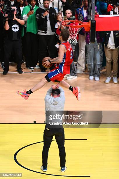 Mac McClung of the Philadelphia 76ers dunks the ball in the 2023 NBA All Star AT&T Slam Dunk Contest at Vivint Arena on February 18, 2023 in Salt...