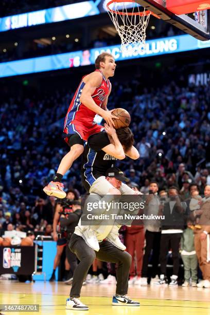 Mac McClung of the Philadelphia 76ers dunks the ball in the 2023 NBA All Star AT&T Slam Dunk Contest at Vivint Arena on February 18, 2023 in Salt...