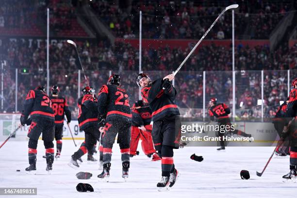 Stefan Noesen of the Carolina Hurricanes celebrates after defeating the Washington Capitals in the 2023 Navy Federal Credit Union NHL Stadium Series...