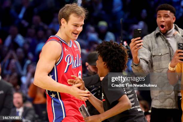 Mac McClung of the Philadelphia 76ers celebrates a dunk in the 2023 NBA All Star AT&T Slam Dunk Contest at Vivint Arena on February 18, 2023 in Salt...