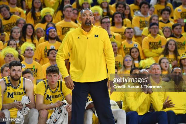 Head Basketball Coach Juwan Howard of the Michigan Wolverines watches a play during the second half of a college basketball game against the Michigan...