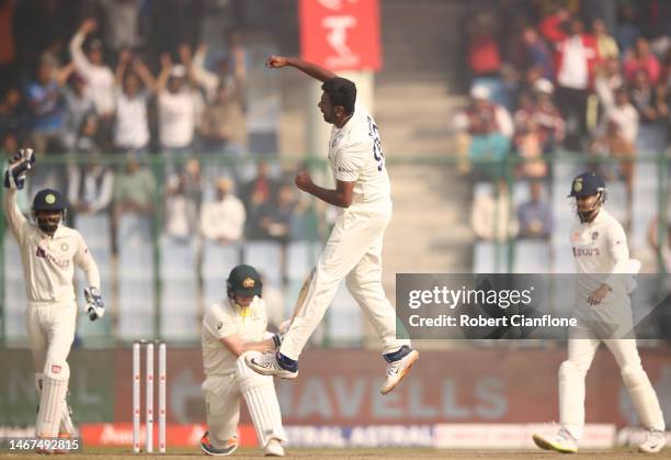 Ravichandran Ashwin of India celebrates taking the wicket of Steve Smith of Australia during day three of the Second Test match in the series between...