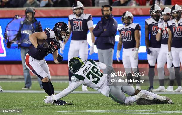 Max Borghi of Houston Roughnecks avoids a tackle attempt by Marcus Murphy Jr. #38 of Orlando Guardians at TDECU Stadium on February 18, 2023 in...