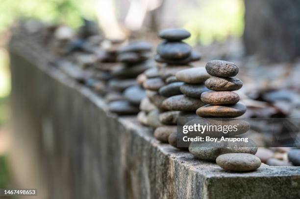 stacked stones decoration in japanese garden. - rauk bildbanksfoton och bilder
