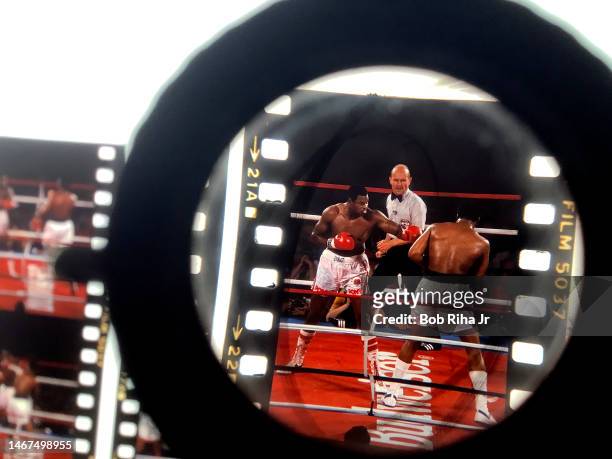 Light table view of Boxing undefeated heavyweights Larry Holmes battles Tim Witherspoon during Championship Fight, May 20, 1983 in Las Vegas, Nevada....